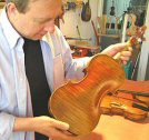 David holding a Viotti